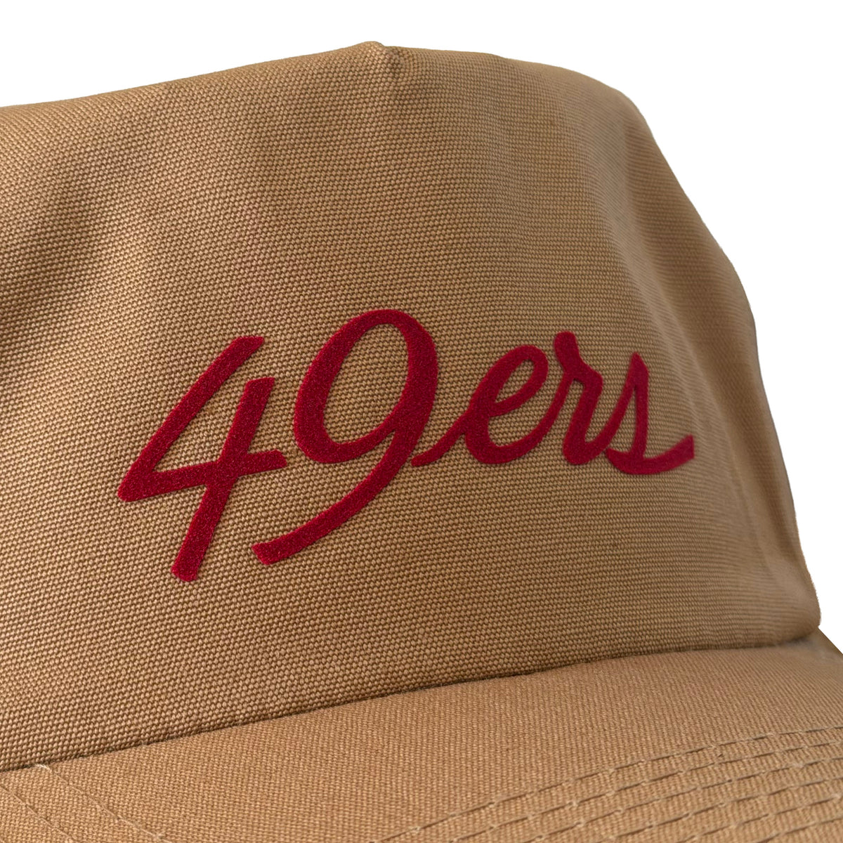 Vintage San Francisco 49ers Script Hat | 5 Panel Snapback Hat in tan with a red flocked 49ers script patch and matching brim close up