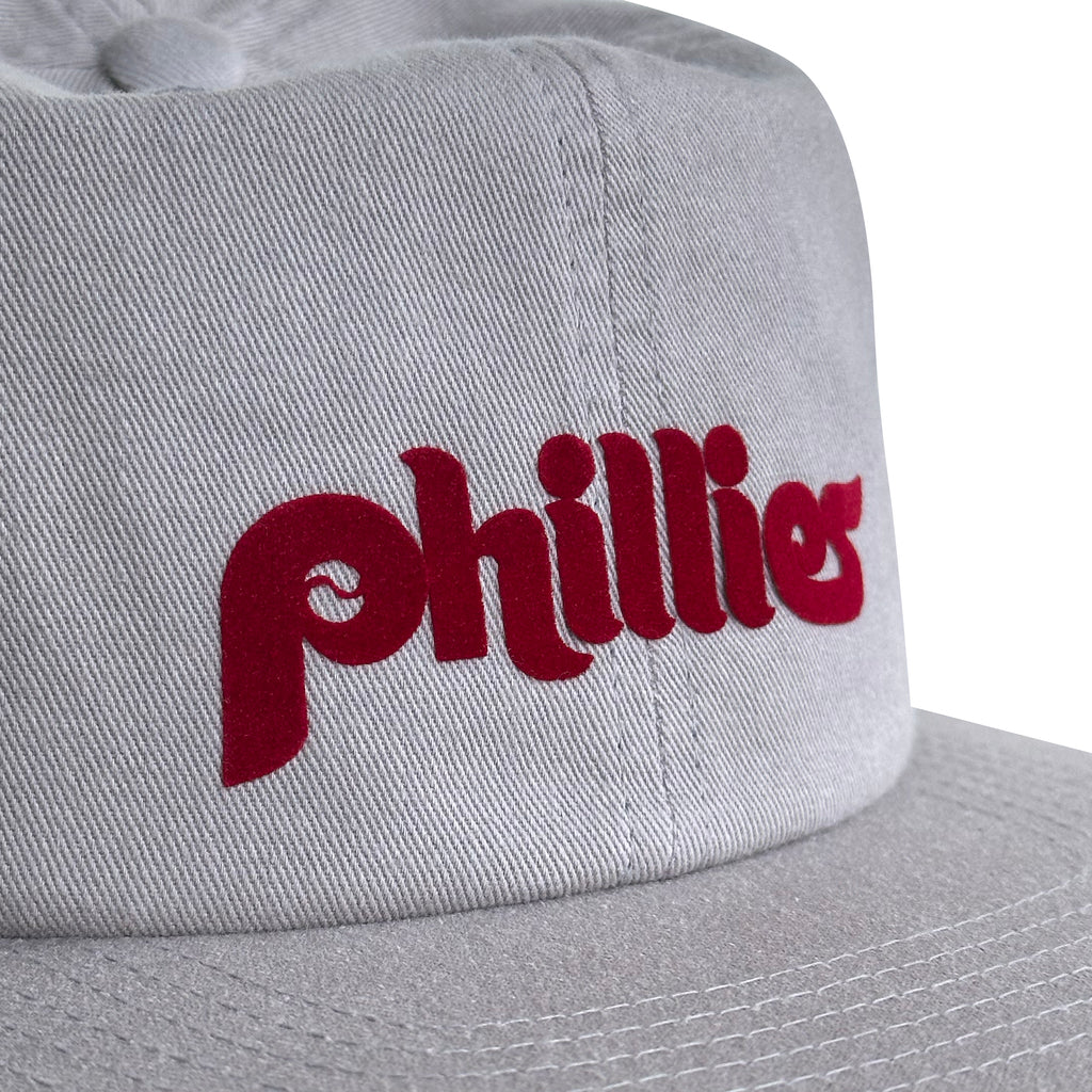 Vintage Philadelphia Phillies Hat | 6 Panel Snapback in gray with red Phillies lettering, shown close up. My Store Home page Baseball