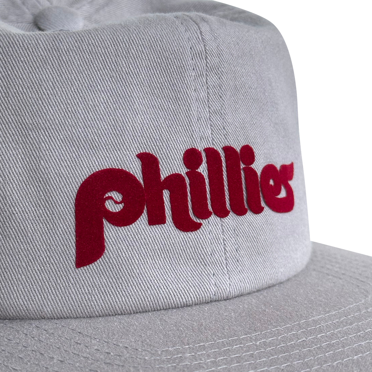 Vintage Philadelphia Phillies Hat | 6 Panel Snapback in gray with red Phillies lettering, shown close up. My Store Home page Baseball