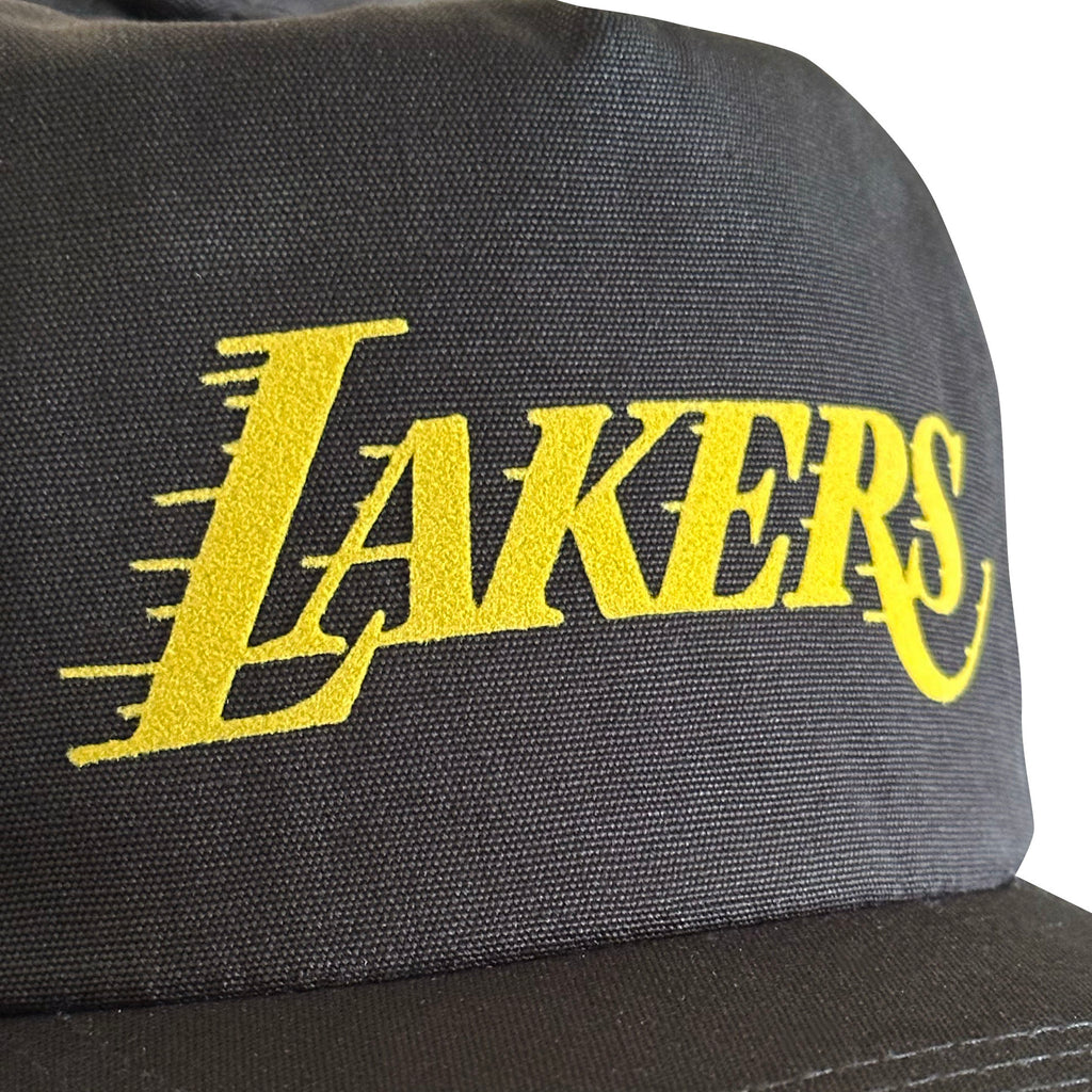 Vintage Los Angeles Lakers Hat | 5 Panel Snapback Hat, black with a yellow Lakers logo from My Store