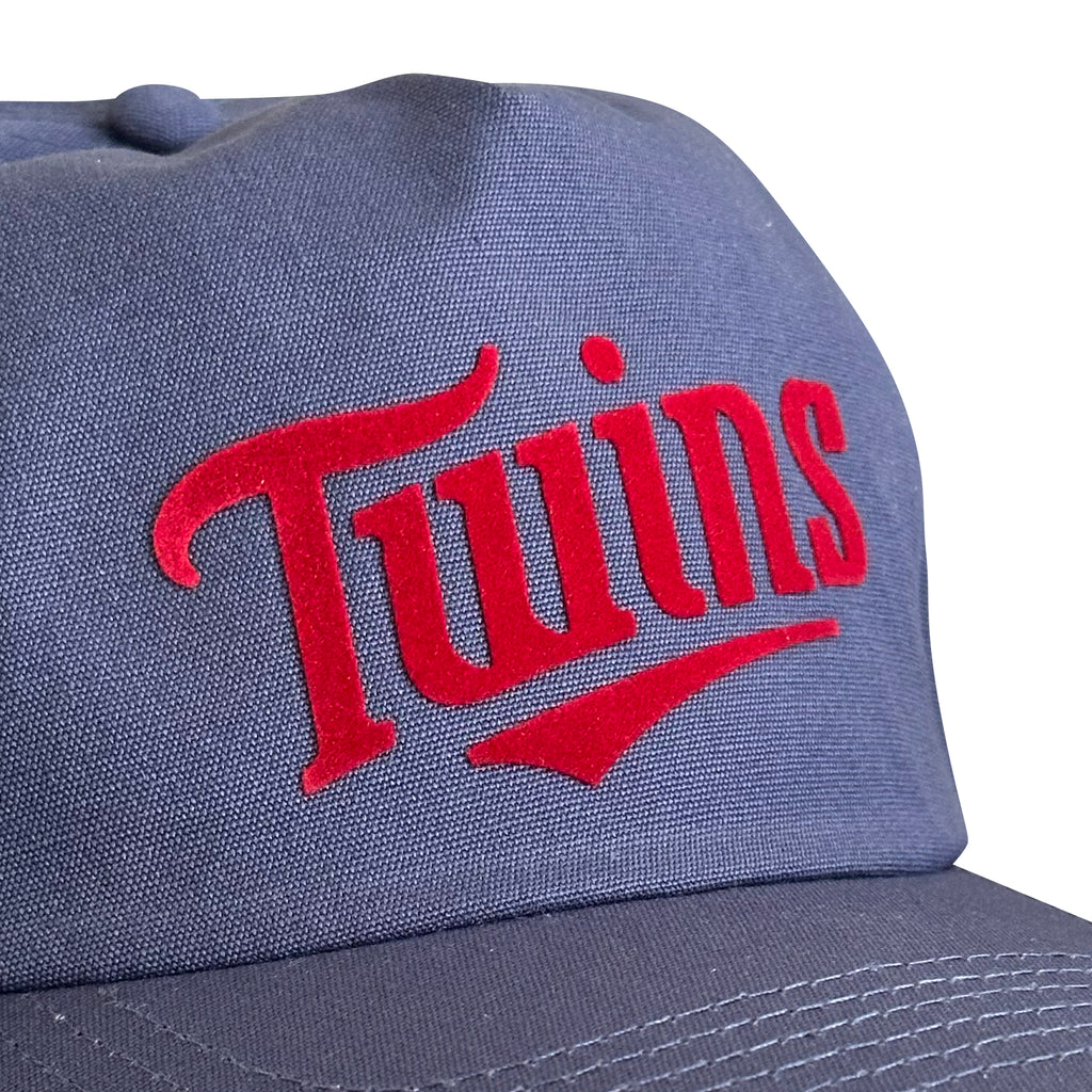 Vintage Minnesota Twins Hat | 5 Panel Snapback Hat, navy cap with a red flocked Twins logo by My Store, featured in Home page, Baseball, and Hot Off The Press