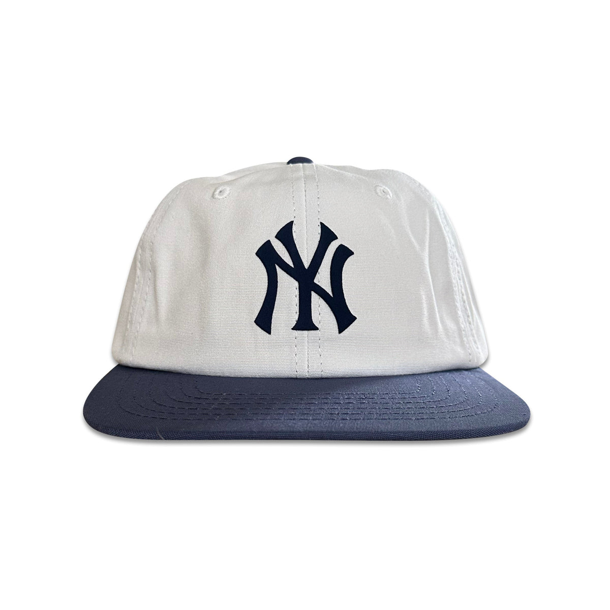 Vintage New York Yankees Hat | 6 Panel Strapback Hat with white crown, navy brim, and Yankees logo from My Store.