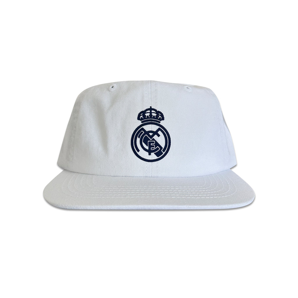 Vintage Real Madrid Hat | 6 Panel Snapback Hat in white with a navy Real Madrid crest on the front and a classic flat brim silhouette